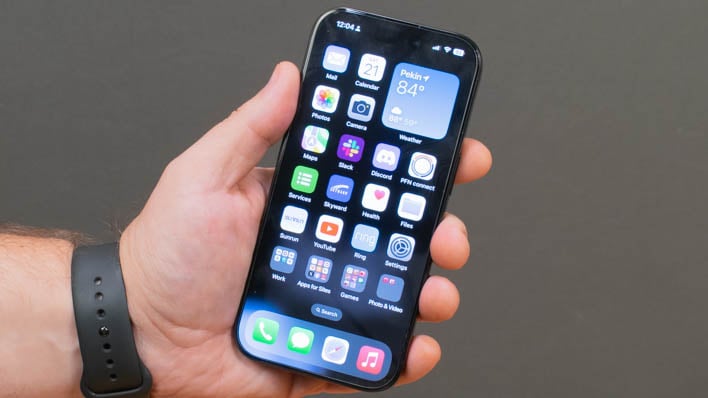 After repair: iPhone with perfect new screen showing clear display and home screen apps, professionally repaired by KWPC